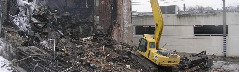 A photo of a building structure being demolished