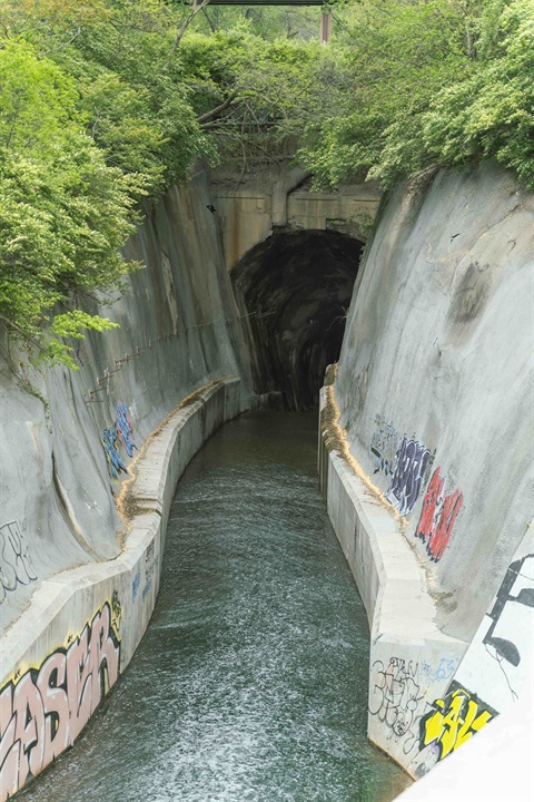 A photograph of water entering the Turkey Creek Tunnel in Kansas City, Kansas