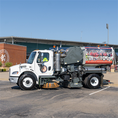 Photograph of an Elgin RegenX street sweeper with a Kansas City Monarchs-themed vehicle wrap
